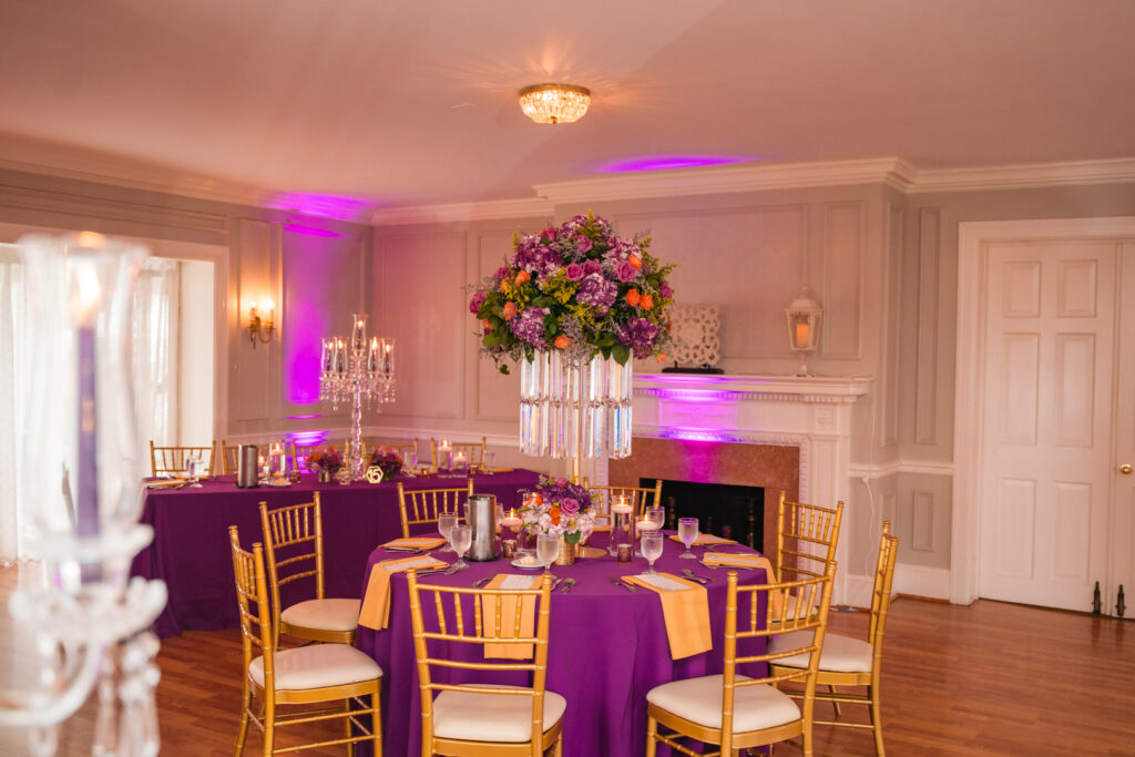 purple themed wedding reception tables