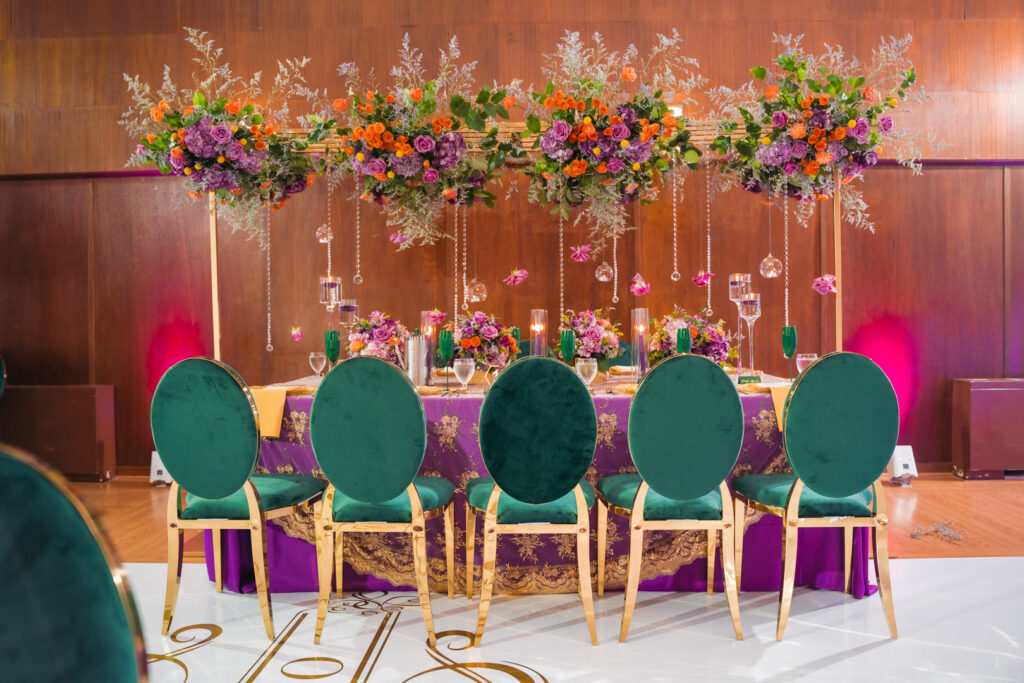 Artsy, maximalist, golden and green table setup