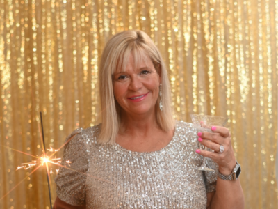 Karen - woman cheers in sparkly dress