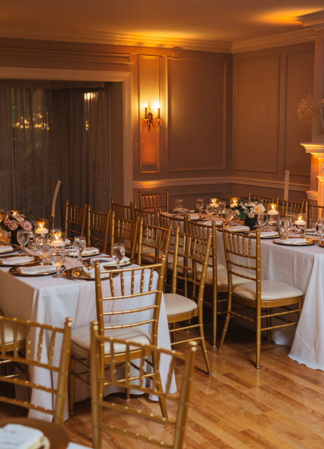 Golden chairs on tables for wedding
