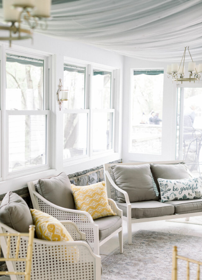 Veranda with gray comfy furniture