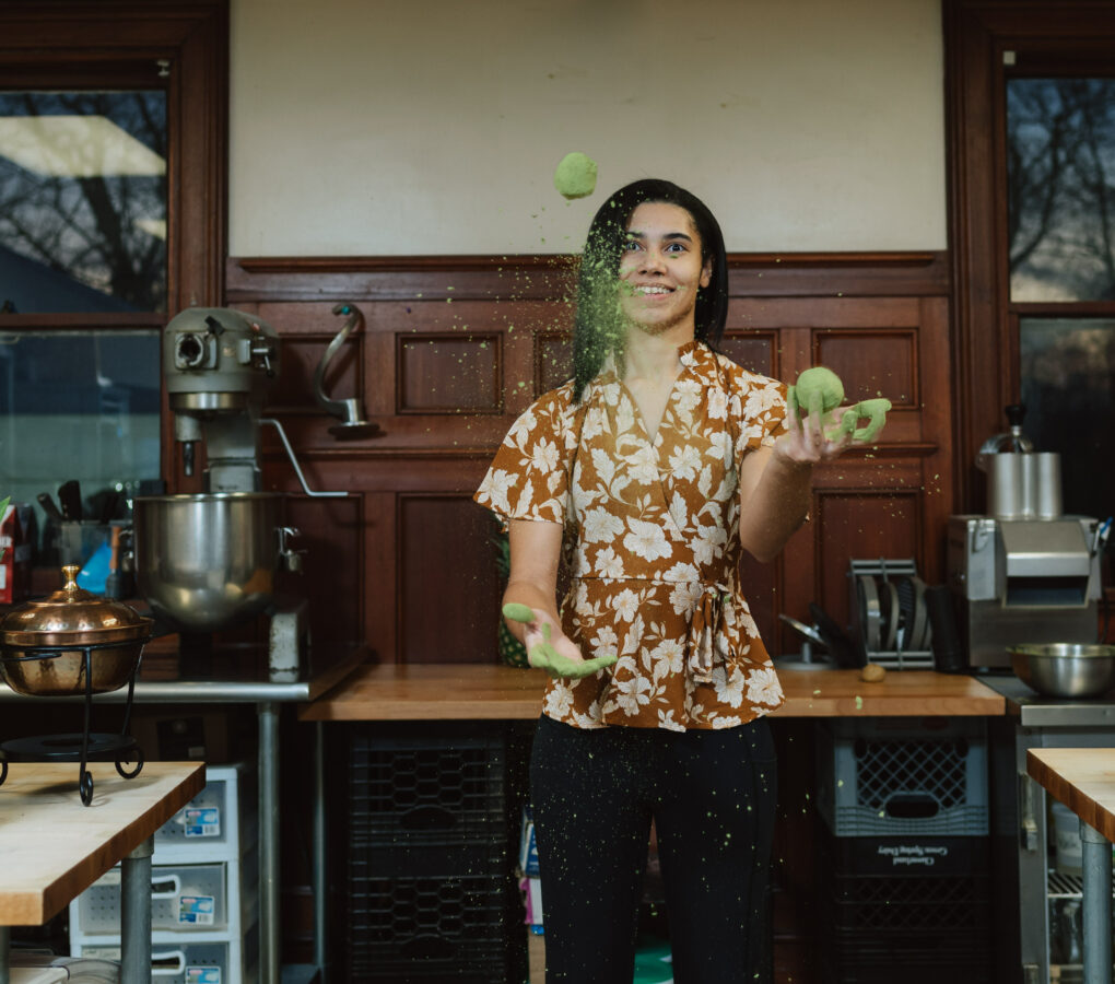 Woman juggling powdered limes