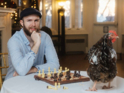 Chef Rion, man playing chess with chicken